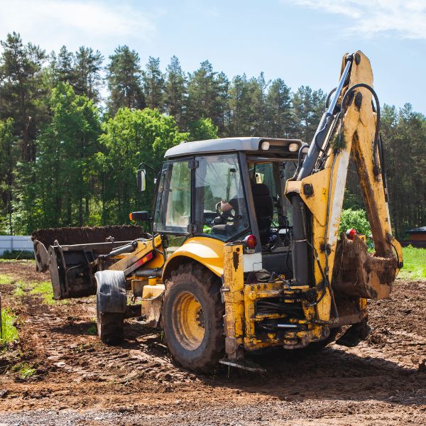 Professional land clearing services removing soil and debris on acreage by West Sydney Landscapes