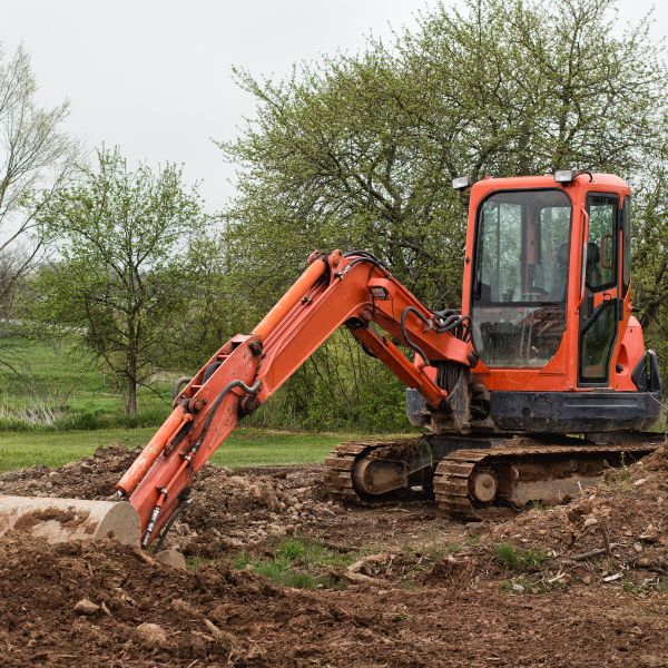 Excavation in Western Sydney with excavator digging soil on a rural property by West Sydney Landscapes.